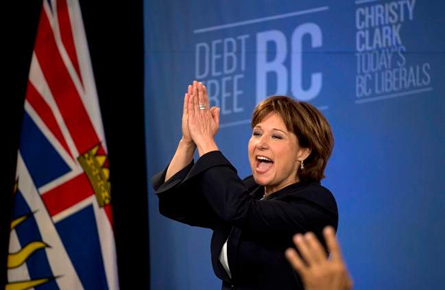 BC Liberal leader Christy Clark waves to the crowd after she arrives on stage after winning the British Columbia provincial election in Vancouver, B.C. Tuesday, May 14, 2013. 