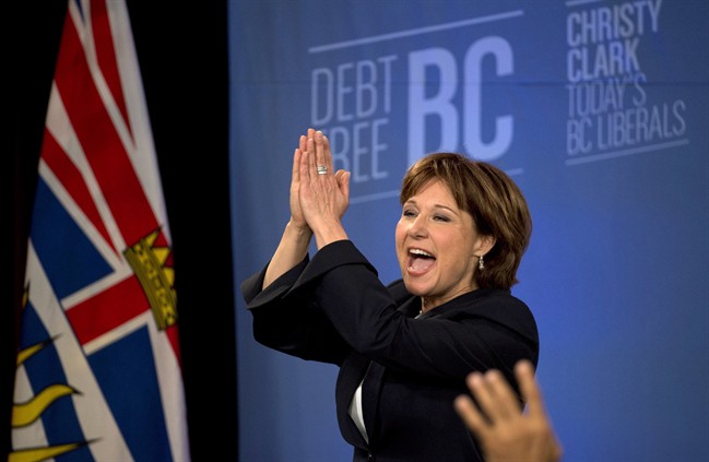 BC Liberal leader Christy Clark waves to the crowd after she arrives on stage after winning the British Columbia provincial election in Vancouver, B.C. Tuesday, May 14, 2013.