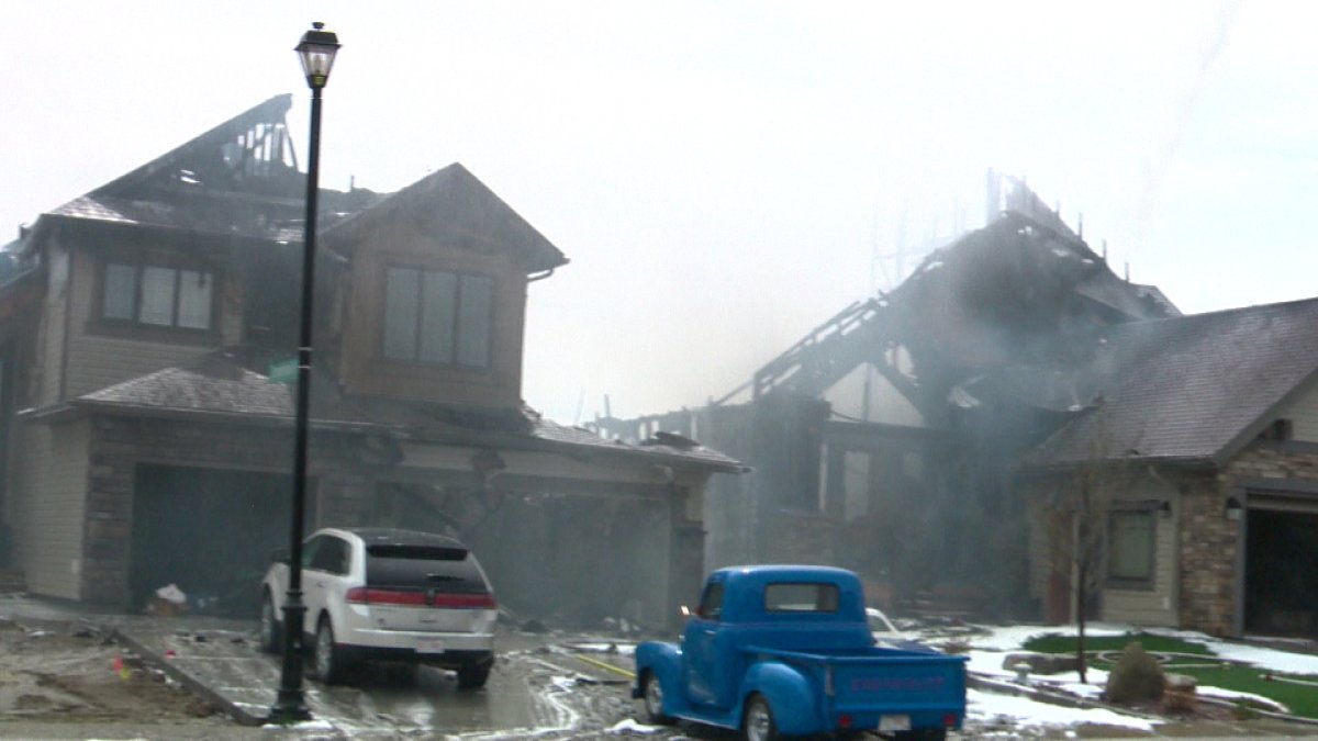 Fire officials say no one was injured Sunday when fire destroyed two west Lethbridge homes.