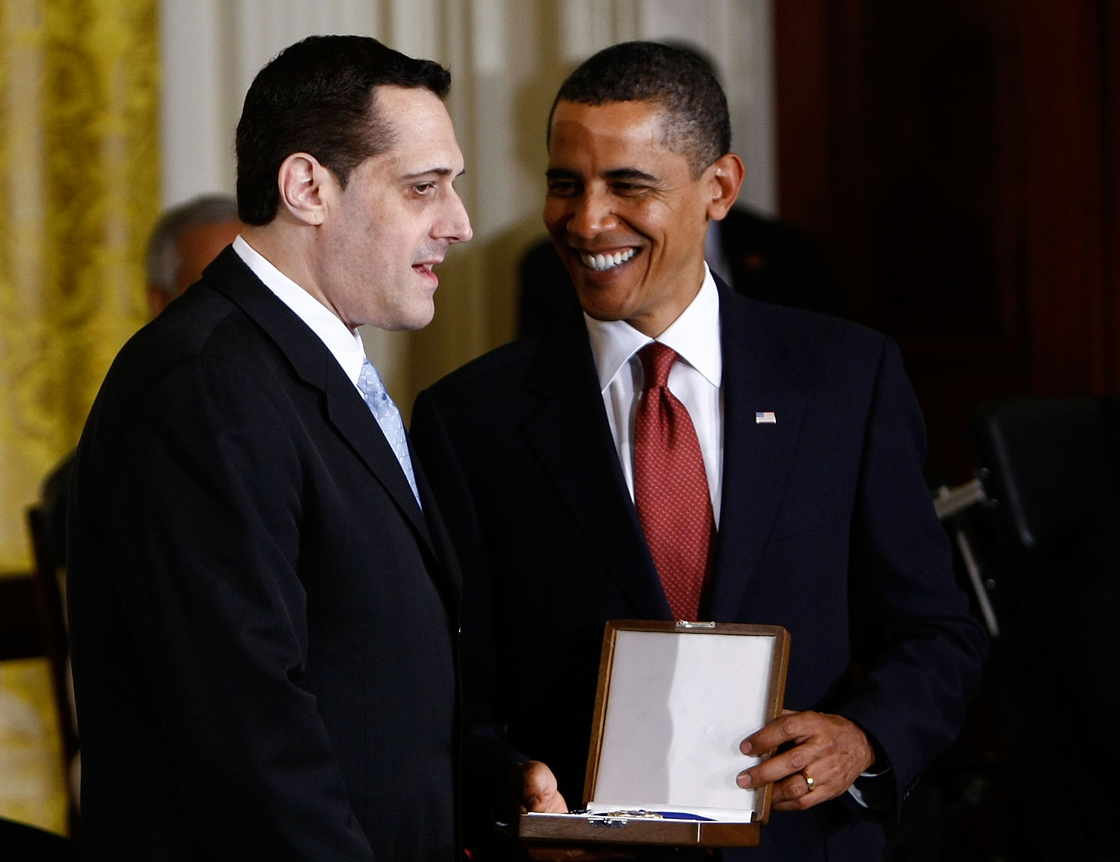 Stuart Milk accepts the Presidential Medal of Freedom from Barack Obama in 2009 on behalf of his uncle Harvey Milk.