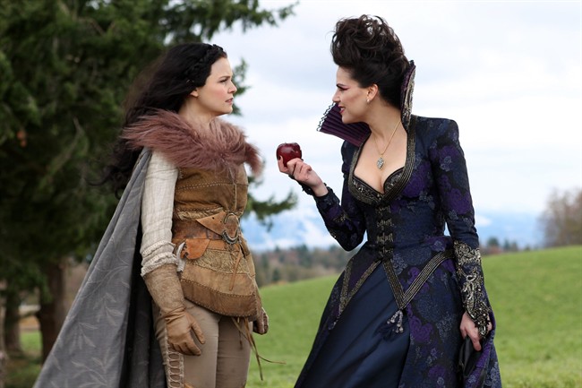 FILE - This publicity photo provided by ABC shows actresses, Ginnifer Goodwin, left, and Lana Parrilla, in a scene from ABC's "Once Upon a Time".
