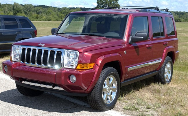 In this Thursday, June 16, 2005 file photo, the 2006 Jeep Commander sits on display at Chelsea Proving Grounds in Chelsea, Mich.