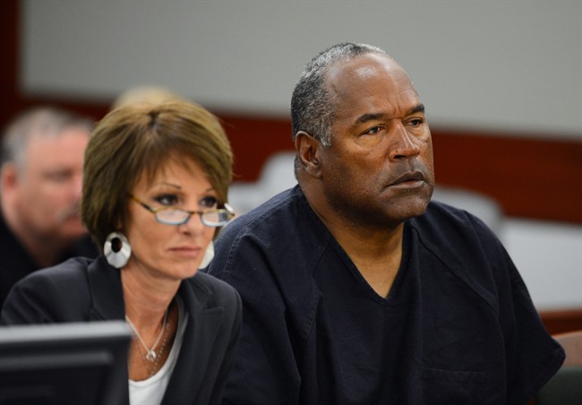 Defense attorney Patricia Palm, left, and O.J. Simpson appear at an evidentiary hearing in Clark County District Court on May 17, 2013 in Las Vegas. 