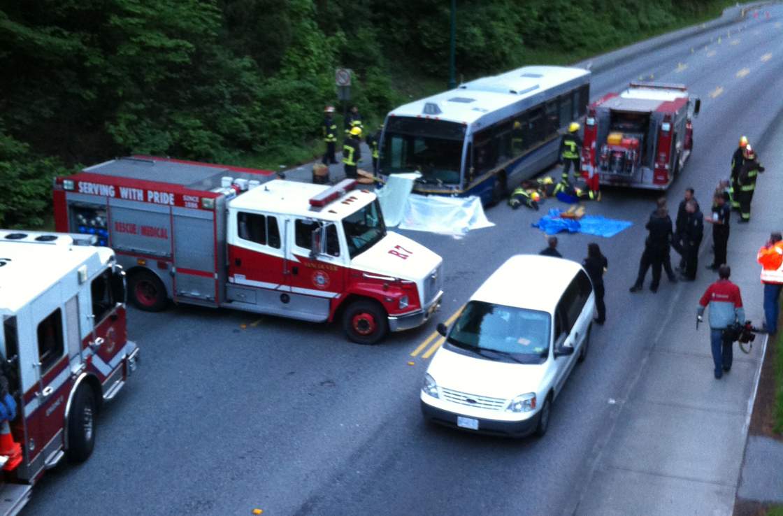 Female cyclist hit pedestrian before falling in front of bus in ...
