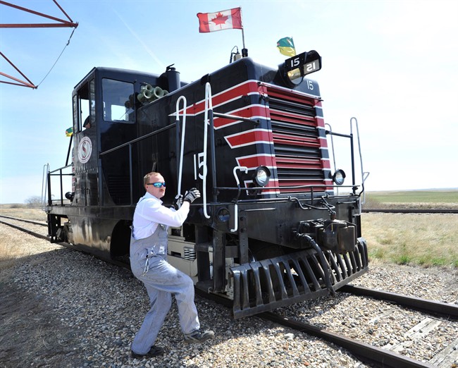 Train engineer Doug Generous prepares to connect the engine at Horizon, Sask. for the return trip as The Southern Prairie Railway kicks off its second season with a run from Ogema Sask. to Horizon, Sunday, May 12, 2013.