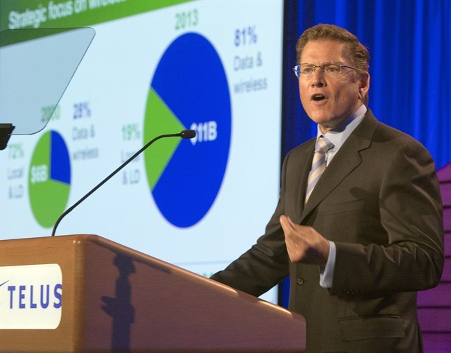 Telus chief executive Darren Entwistle speaks to shareholders the company's annual meeting Thursday, May 9, 2013 in Montreal. On Monday March 31, Telus announced that Entwistle is steppinig aside as president and CEO.