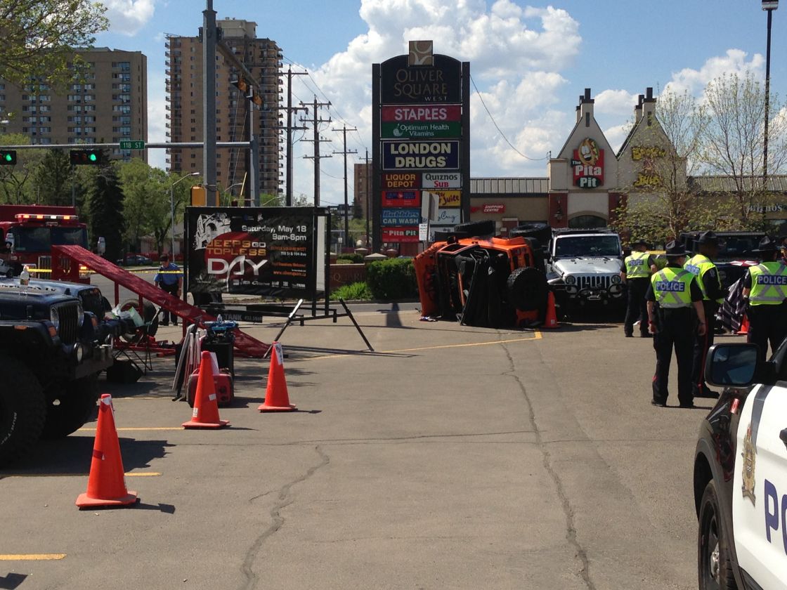 Edmonton police say a woman in her 20s has died, after a Jeep stunt went terribly wrong in Oliver Square, Saturday, May 18, 2013. 