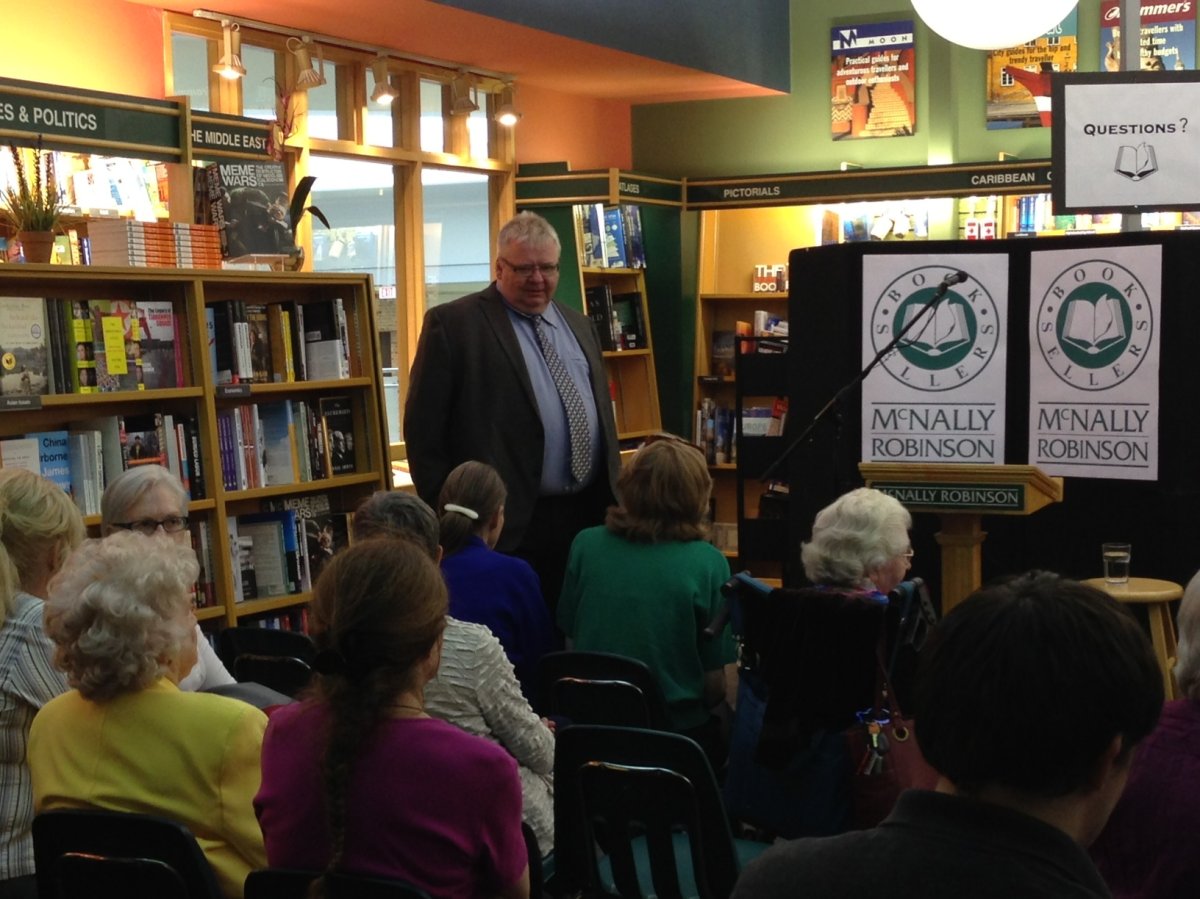 Mark Stobbe adresses crowd at his book signing for "Lessons From Remand".