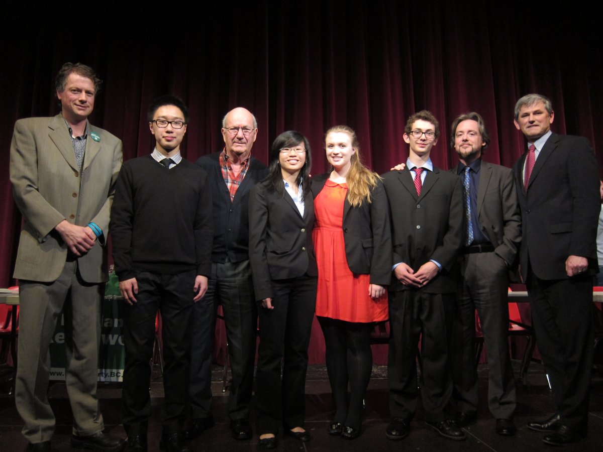 Students from Student Vote Initiative and the four candidates who attended the debate at Magee Secondary School.