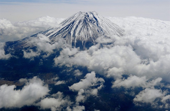 Mt. Fuji is seen from Shizuoka prefecture, central Japan Wednesday, May 1, 2013. 