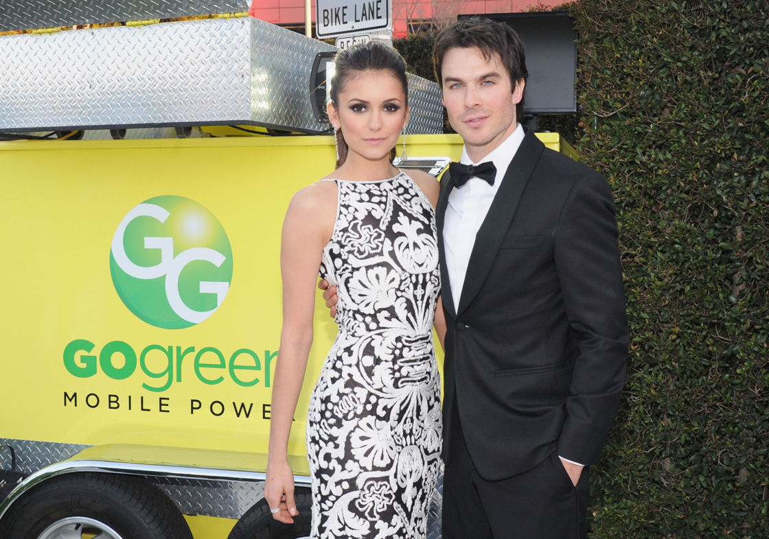 Nina Dobrev and Ian Somerhalder pose together at a February 2013 event.
