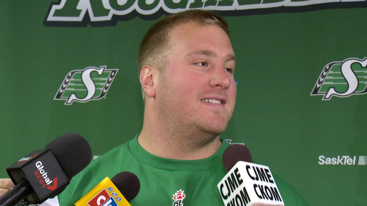 Offensive linemen Corey Watman meets the media in Regina .