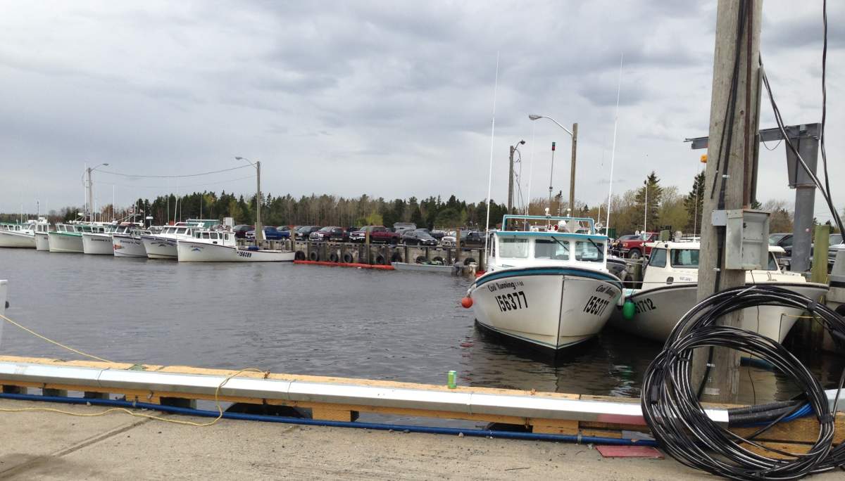 Fishermen at the Tabusintac wharf mourning loss of three fishermen over the weekend.