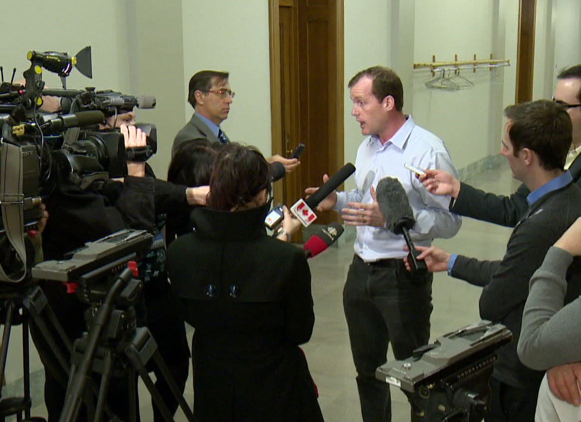 NDP leader Trent Wotherspoon speaks to reporters about concerns over spending at a carbon capture research centre.