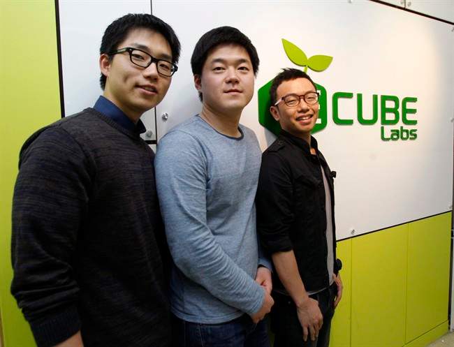 Ecube Labs CEO Kwon Sunbeom, left, poses with his co-founders Kwon Hyungsuk and Lee Seungjae for a photo at their office in Seoul, South Korea. Instead while his peers were seeking jobs at Samsung and LG, Kwon Sunbeom scaled back his studies and started the company with friends. 