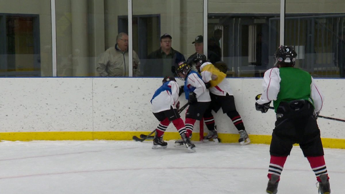 Hockey Canada voted to ban body-checking in peewee leagues at its annual general meeting in Charlottetown on Saturday, with only the Saskatchewan Hockey Association voting against it.