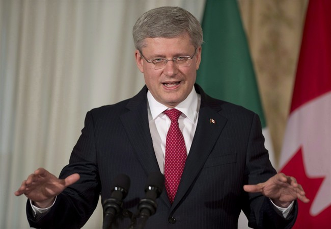 Canadian Prime Minister Stephen Harper speaks about the G8 during a joint news conference with Irish Prime Minister Enda Kenny at Farmleigh House in Dublin, Ireland, Sunday, June 16, 2013. 