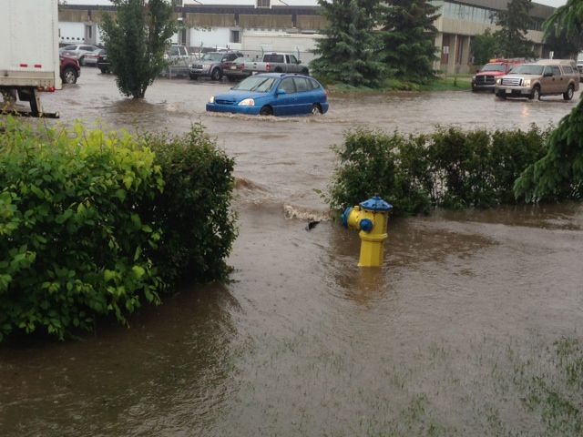 Rain sparks flash flooding in Edmonton on June 25, 2013.