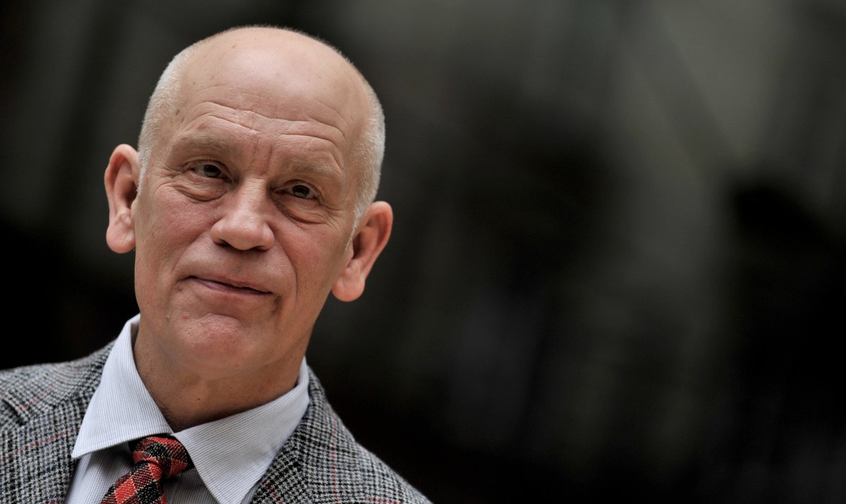 John Malkovich, pictured in February 2013, helped save a man bleeding on a Toronto street.