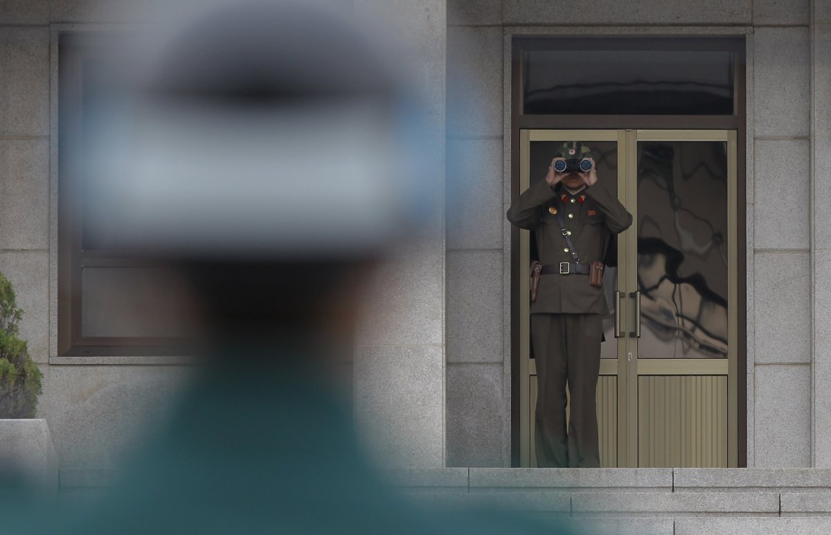 North and South Korea will meet in a village straddling their heavily armed border Sunday for the first government-level talks on the peninsula in more than two years as they try to lower tension and restore stalled projects that once symbolized their rapprochement. (Photo by Chung Sung-Jun/Getty Images).