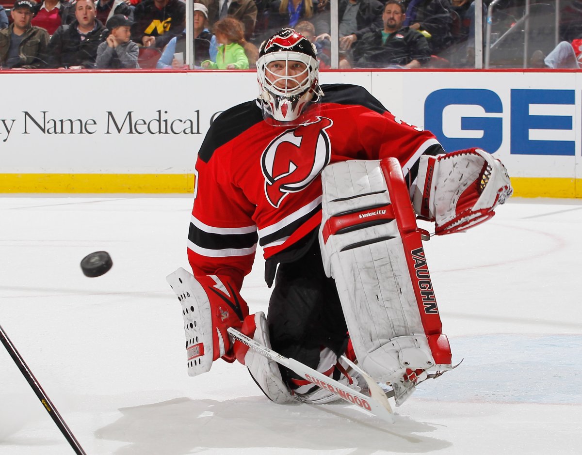 New Jersey Devils veteran Martin Brodeur will serve as cover athlete on EA Sports' made-in-Canada "NHL 14" video game after winning a fan vote over fellow goalie Sergei Bobrovsky of Columbus. (Photo by Andy Marlin/NHLI via Getty Images).