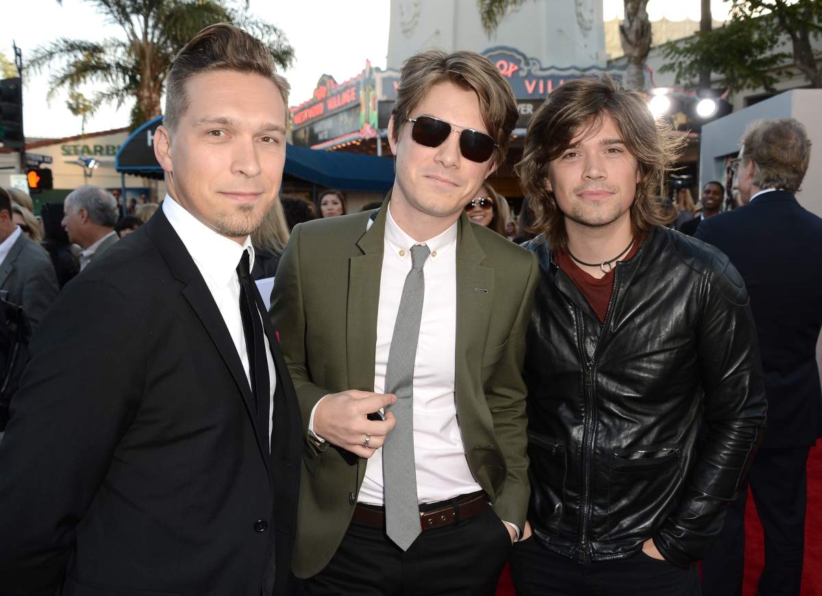 Musicians Isaac Hanson, Taylor Hanson, and Zac Hanson of the band Hanson arrive at the premiere of Warner Bros. Pictures' 'Hangover Part 3' on May 20, 2013 in Westwood, California.