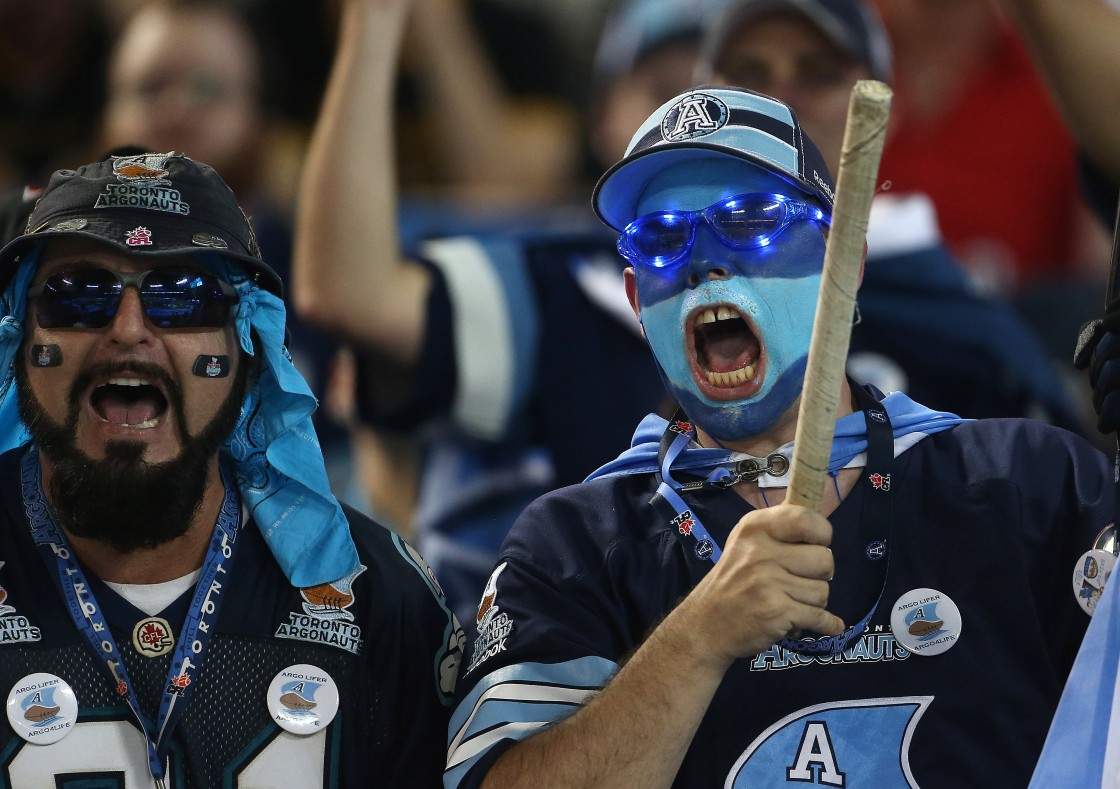 Argos fans cheer as the Toronto Argonauts play the Hamilton Tiger-Cats in the season opener at Rogers Centre in Toronto,  June 28, 2013.        (Steve Russell/Toronto Star via Getty Images).