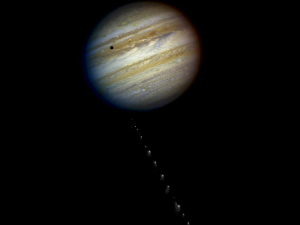 This composite image shows the 21 fragments of Comet Shoemaker-Levy 9 as it approached Jupiter in July 1994.