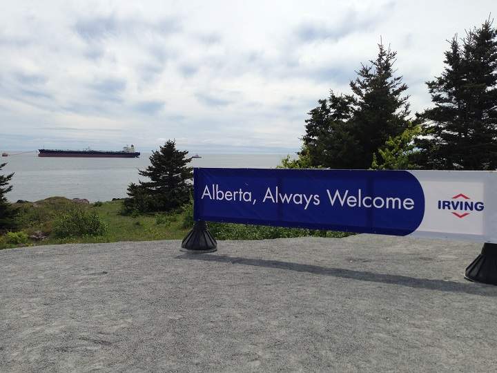 An Irving Oil sign at a supertanker terminal, the last stop on Redford’s tour of Saint John.