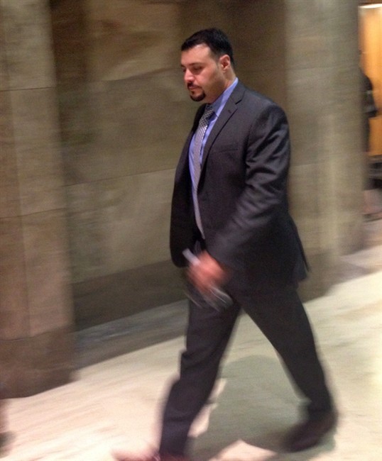 G20 cop Const. Babak Andalib-Goortani arrives at court in Toronto