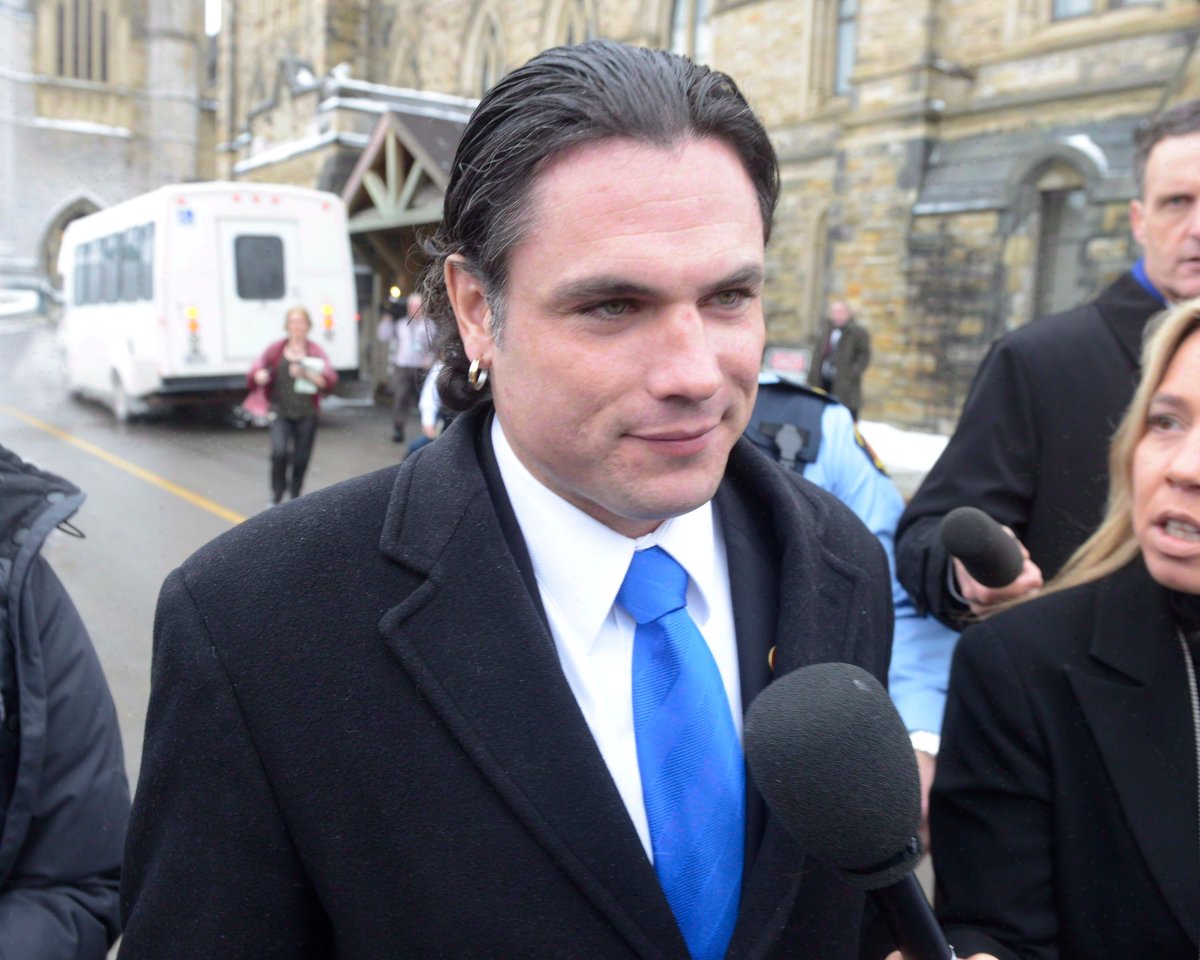 Sen. Patrick Brazeau talks to media on Parliament Hill in Ottawa, Tuesday, Feb.12, 2013. The RCMP says it is examining Senate expense claims following an independent audit and a critical report from the upper chamber's internal economy committee.THE CANADIAN PRESS/Adrian Wyld.