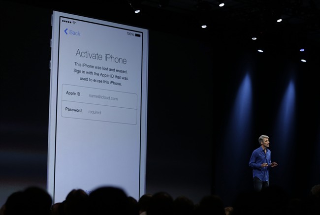 Craig Federighi, senior vice president of Software Engineering at Apple demonstrates the new activation lock security feature in iOS 7 during the keynote address of the Apple Worldwide Developers Conference Monday, June 10, 2013 in San Francisco. 