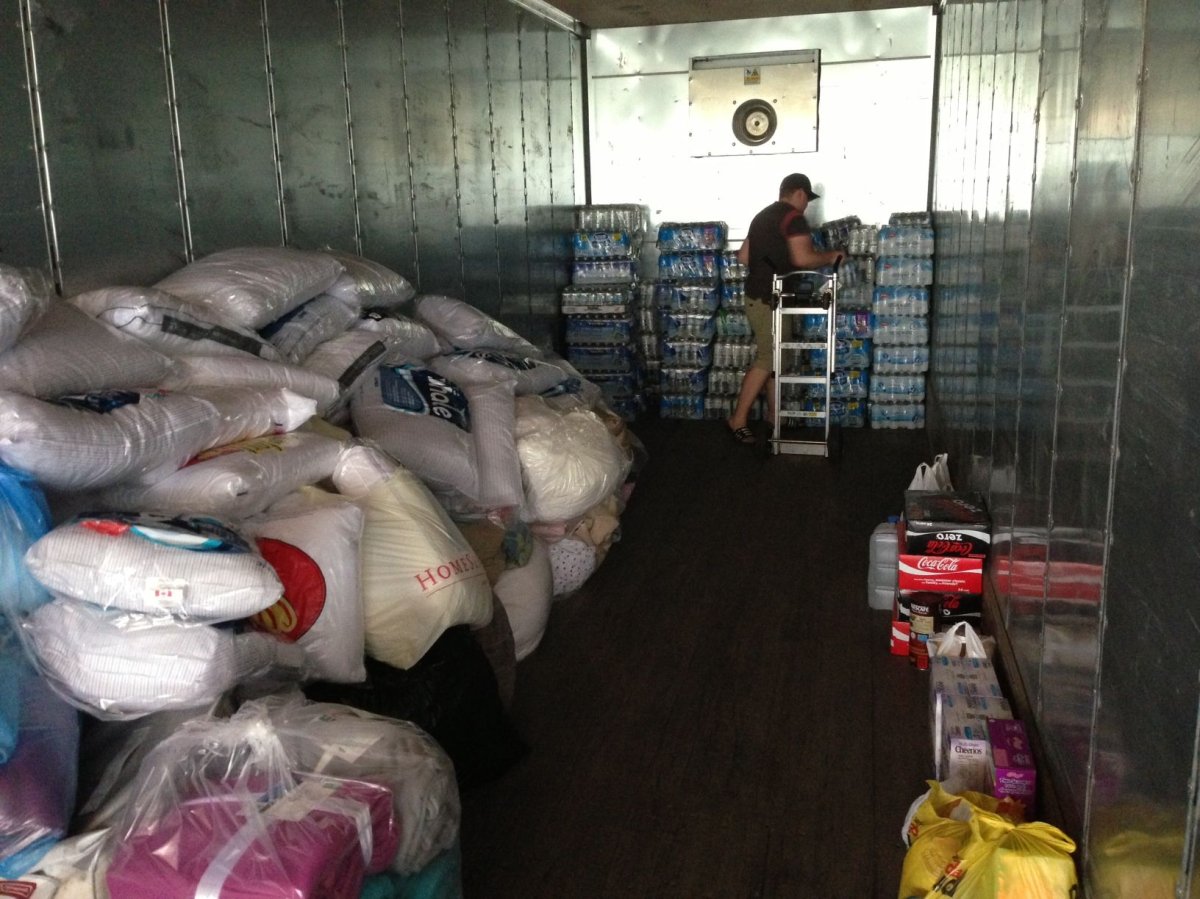 As 630 CHED broadcasted live from its parking lot, the second Roseneau trailer was being filled with donations from listeners. 