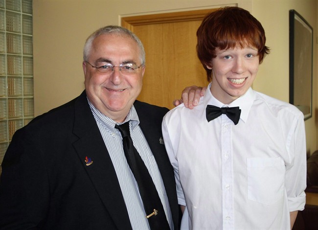 Ottawa city councillor Allan Hubley poses with his son Jamie in this family photo released on Monday Oct. 17, 2011. A new national anti-bullying and anti-discrimination program was unveiled on Monday at the late teen's former school. 