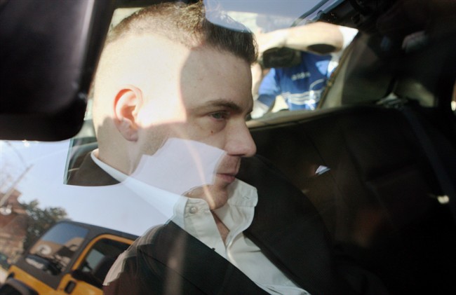Michael Rafferty is transported from the courthouse in the back of police cruiser in London, Ont., on March, 14, 2012. 