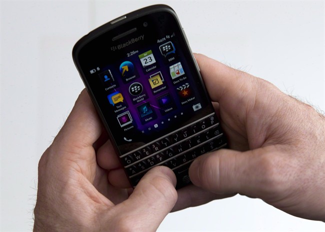 A BlackBerry Q10 smartphone is shown.