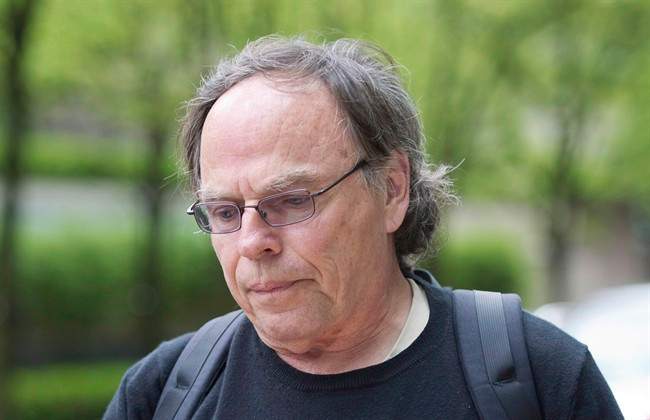 Karl Lilgert, navigator of the Queen of the North, leaves the law courts in Vancouver, B.C. on Monday, May 13, 2013. THE CANADIAN PRESS/Justin Tang.