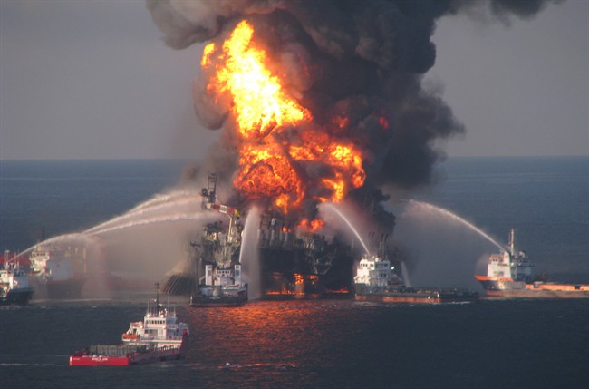 In this April 21, 2010 photo, fire boat response crews spray water on the blazing remnants of BP's Deepwater Horizon offshore oil rig. 
