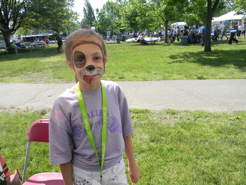 Girl face painting Global Toronto tent JDRF Walk