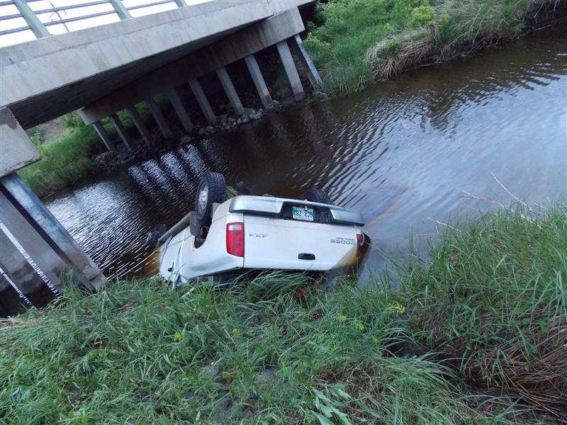 RCMP said a 28-year-old man rolled his pick-up truck into the Little Souris River Friday morning after falling asleep behind the wheel. 