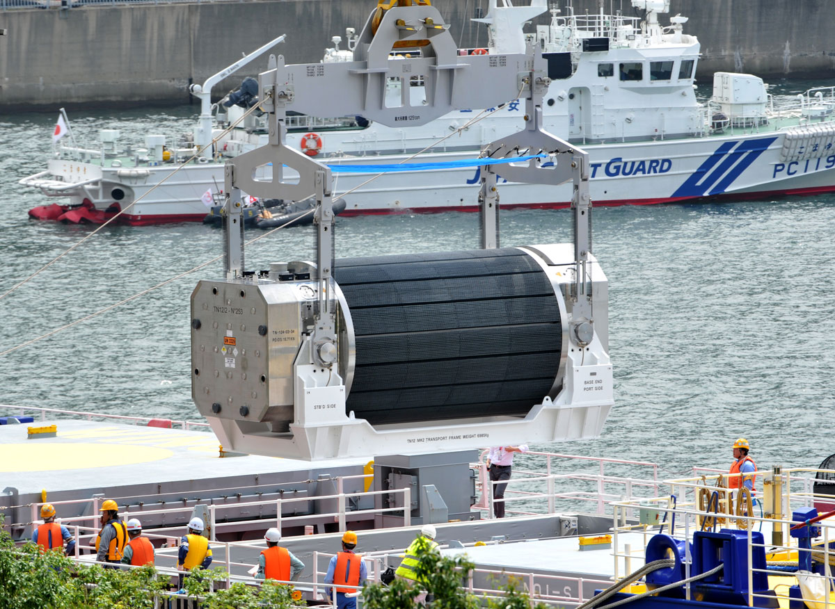 A container of MOX fuel is unloaded from a vessel at the Kansai Electric Power Co.'s Takahama nuclear plant in Fukui prefecture on June 27, 2013.  