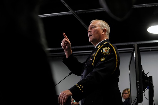 Toronto Police Chief Bill Blair holds a news conference in Toronto, Thursday, June 13, 2013. THE CANADIAN PRESS/Galit Rodan.