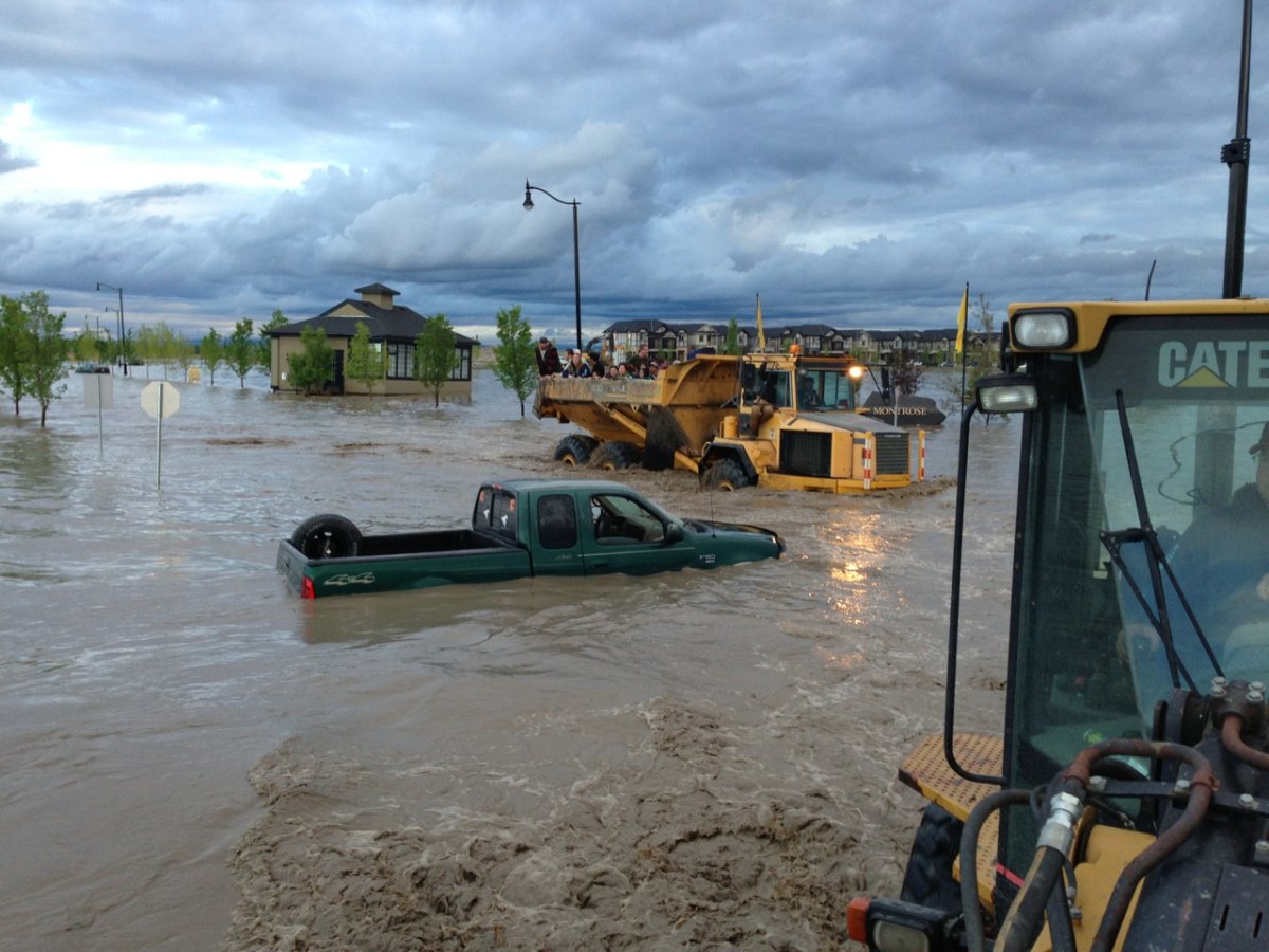 Employees of a show home in High River are evacuated in an unorthodox way.