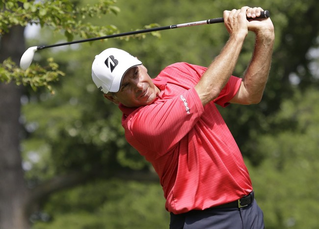 Fred Couples tees off on the second hole during the final round of the Encompass Championship golf tournament on Sunday, June 23, 2013, in Glenview, Ill. 