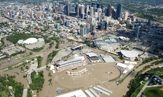 A flooded downtown Calgary is seen from a aerial view of the city Saturday, June 22, 2013. 