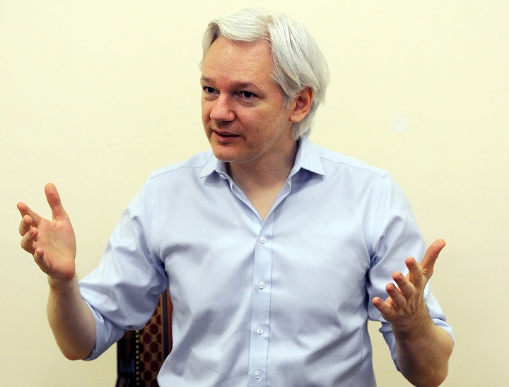 Wikileaks founder Julian Assange speaks to the media inside the Ecuadorian Embassy in London on June 14, 2013.