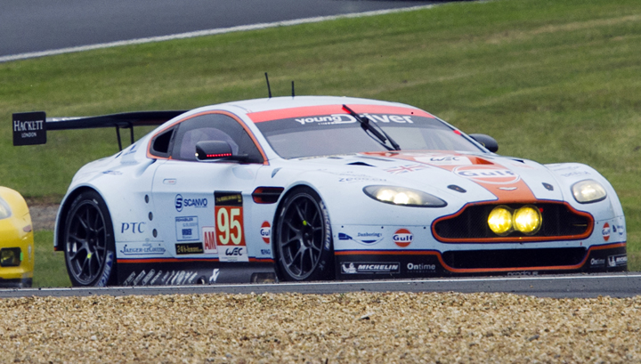 Danish pilot Allan Simonsen (C) steers his Aston Martin Vantage number 95, before his accident, during the 90th edition of Le Mans 24 hours endurance race on June 22, 2013, in Le Mans, western France.