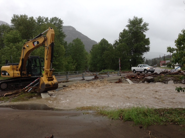 Lyons Creek flooded in Blairmore Thursday, taking out the CP Rail bridge.