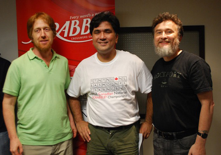 Adam Logan, left, with Canadian Scrabble Championship Director John Chew and finalist Ross Brown. 