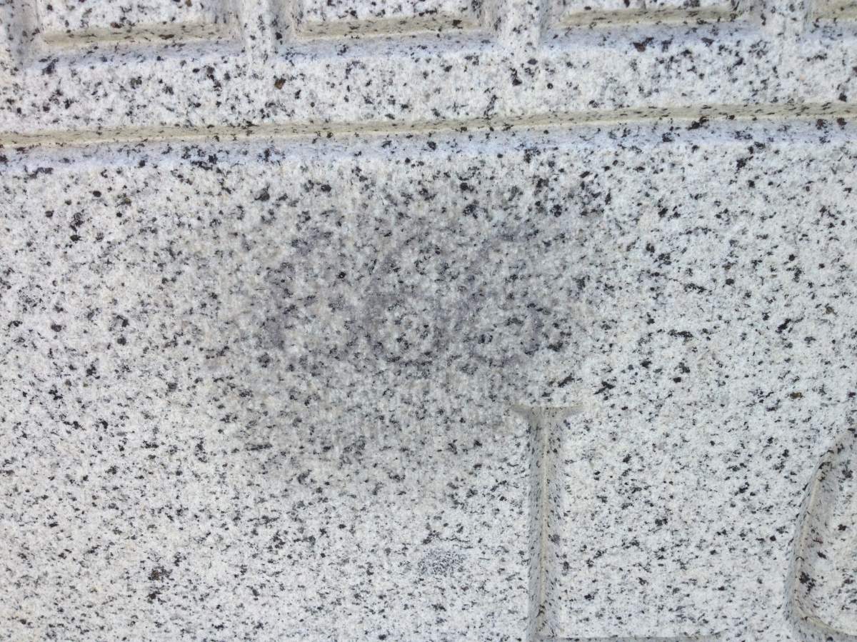 Someone scrawled the numbers ‘666’ along with an upside-down cross, on the memorial in Union Park Cemetary to Peter Lougheed.